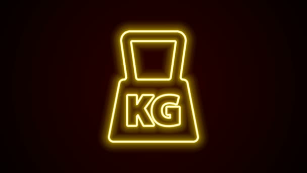 Glowing neon line Weight icon isolated on black background. Kilogram weight block for weight lifting and scale. Mass symbol. 4K Video motion graphic animation — Stock Video