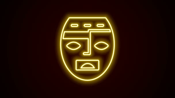 Glowing neon line Mexican mayan or aztec mask icon isolated on black background. 4K Video motion graphic animation — Stock Video