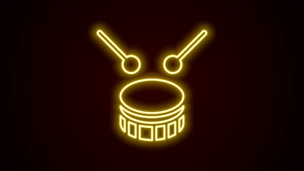 Светящаяся неоновая линия Барабан с барабанами значок палочки изолированы на черном фоне. Музыкальный знак. Символ музыкального инструмента. Видеографическая анимация 4K — стоковое видео