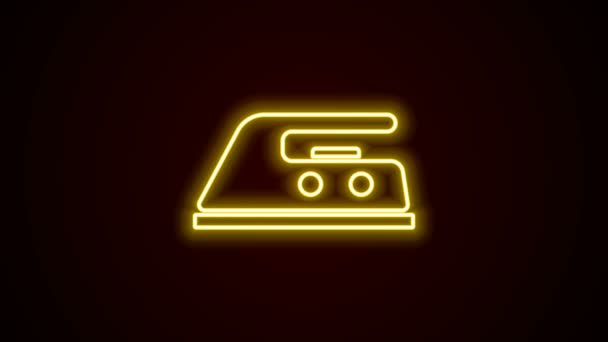 Glowing neon line Electric iron icon isolated on black background. Steam iron. 4K Video motion graphic animation — Stock Video