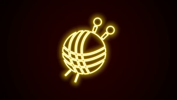 Žhnoucí neonová šňůra Přízová koule s ikonou pletacích jehel izolovaná na černém pozadí. Štítek na ruční výrobu, pletení nebo na zakázku. Grafická animace pohybu videa 4K — Stock video