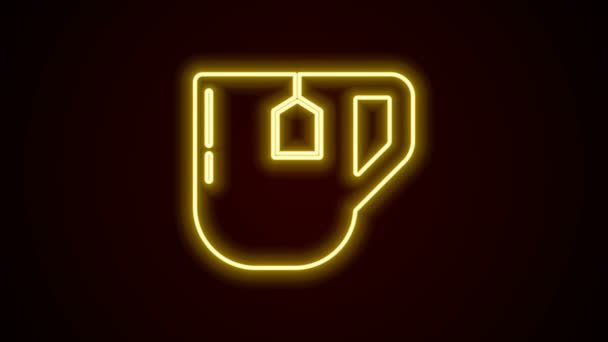 Strălucitoare linie de neon Ceașcă de ceai cu pictogramă sac de ceai izolat pe fundal negru. 4K Animație grafică în mișcare video — Videoclip de stoc