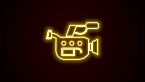 Glowing neon line Cinema camera icon isolated on black background. Video camera. Movie sign. Film projector. 4K Video motion graphic animation — Stock Video