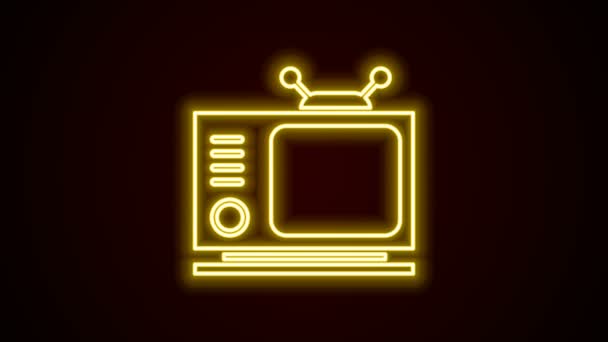 Parlayan neon hattı Retro TV simgesi siyah arkaplanda izole edildi. Televizyon tabelası. 4K Video hareketli grafik canlandırması — Stok video