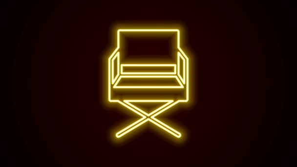 Linha de néon brilhante ícone da cadeira do filme diretor isolado no fundo preto. Indústria cinematográfica. Animação gráfica em movimento de vídeo 4K — Vídeo de Stock
