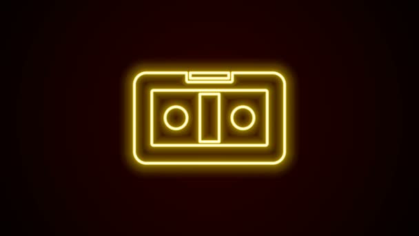 Zářící neonová linka VHS video kazeta ikona izolované na černém pozadí. Grafická animace pohybu videa 4K — Stock video