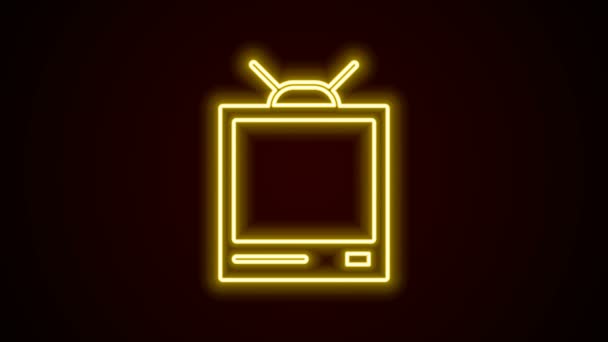 Zářící neonová linka Retro TV ikona izolované na černém pozadí. Televizní značka. Grafická animace pohybu videa 4K — Stock video