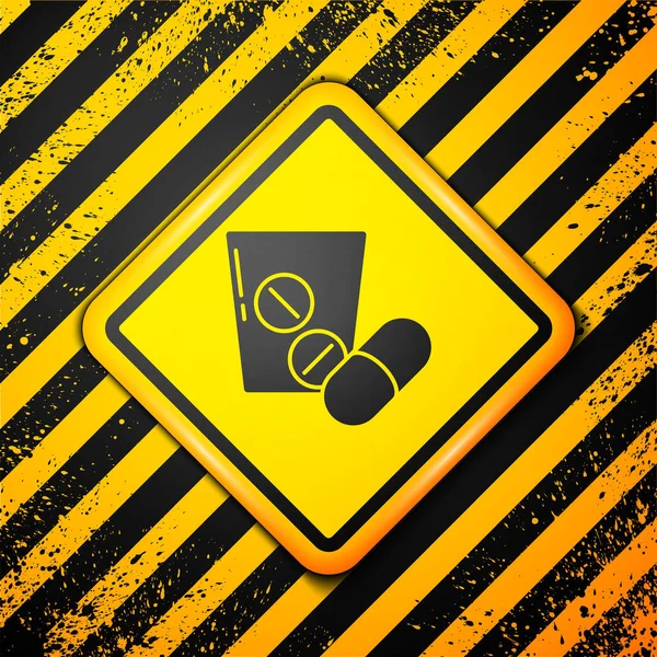 黄色の背景に隔離された黒い薬の丸薬またはタブレットのアイコン カプセル薬と薬のサイン 薬局の設計 警告サインだ ベクトル — ストックベクタ