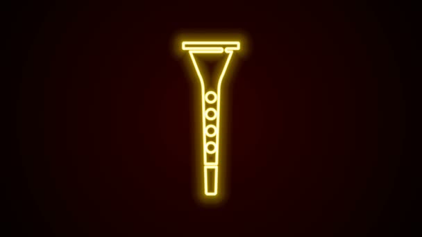 Glowing neon line Clarinet icon isolated on black background. Musical instrument. 4K Video motion graphic animation — Stock Video