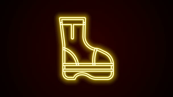 Gloeiende neon lijn Brandlaarzen pictogram geïsoleerd op zwarte achtergrond. 4K Video motion grafische animatie — Stockvideo