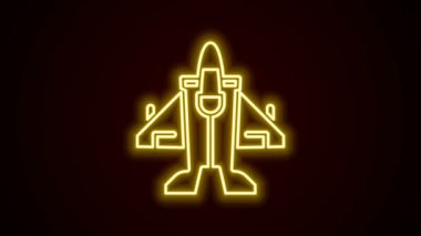 Parlayan neon hattı Jet savaş ikonu siyah arka planda izole edildi. Askeri uçak. 4K Video hareketli grafik canlandırması