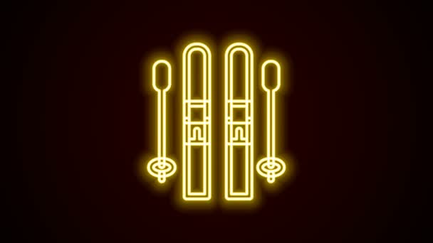 Glowing neon line Ski and sticks icon isolated on black background. Extreme sport. Skiing equipment. Winter sports icon. 4K Video motion graphic animation — Stock Video