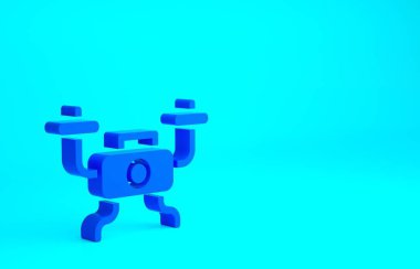 Mavi İHA uçan ikonu mavi arka planda izole edildi. Video ve fotoğraf makinesi sembollü dörtlü helikopter. Minimalizm kavramı. 3d illüstrasyon 3B canlandırma.