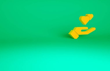 Turuncu Kalp 'in el resmi yeşil arkaplanda izole edildi. El çabukluğu aşk sembolü. Sevgililer Günü sembolü. Minimalizm kavramı. 3d illüstrasyon 3B canlandırma.
