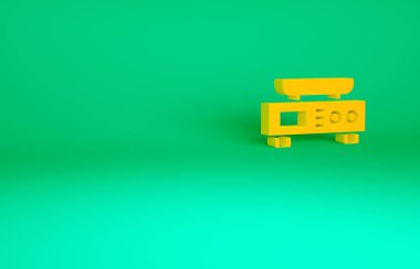 Turuncu Elektronik ölçek simgesi yeşil arkaplanda izole edildi. Ağırlık ölçüm aletleri. Minimalizm kavramı. 3d illüstrasyon 3B canlandırma.