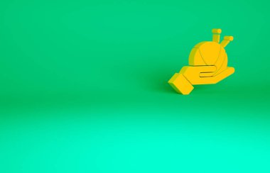 Yeşil zemin üzerinde örgü iğneleri olan turuncu iplik topu. El yapımı, örgü ya da terzi için etiket. Minimalizm kavramı. 3d illüstrasyon 3B canlandırma.