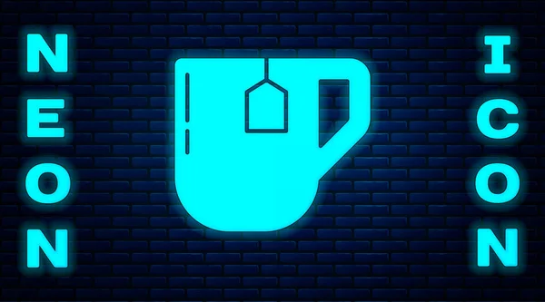 Glowing Neon Cup Tea Tea Bag Icon Isolated Brick Wall — Stock Vector