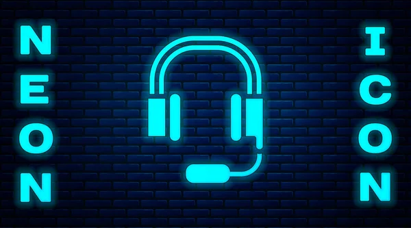 Glowing Neon Headphones Microphone Icon Isolated Brick Wall Background Vector — Wektor stockowy