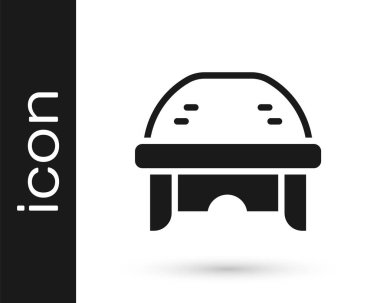 Siyah Hokey miğferi simgesi beyaz arkaplanda izole edildi. Vektör.