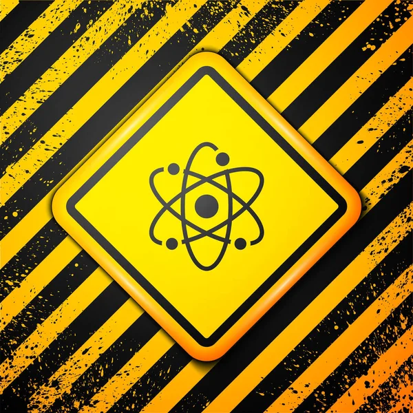 Siyah Atom Simgesi Sarı Arkaplanda Izole Edildi Bilimin Eğitimin Nükleer — Stok Vektör