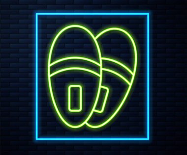 Parlayan neon çizgili Terlik simgesi tuğla duvar arkasında izole edilmiş. Parmak arası terlik işareti. Vektör.