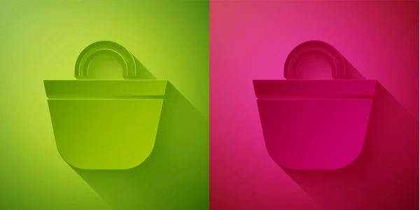 Corte Papel Icono Bolsa Playa Aislado Sobre Fondo Verde Rosa — Vector de stock