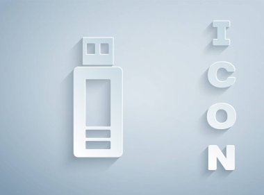 Kağıt kesiği USB flash disk simgesi gri arkaplanda izole edildi. Kağıt sanatı tarzı. Vektör.