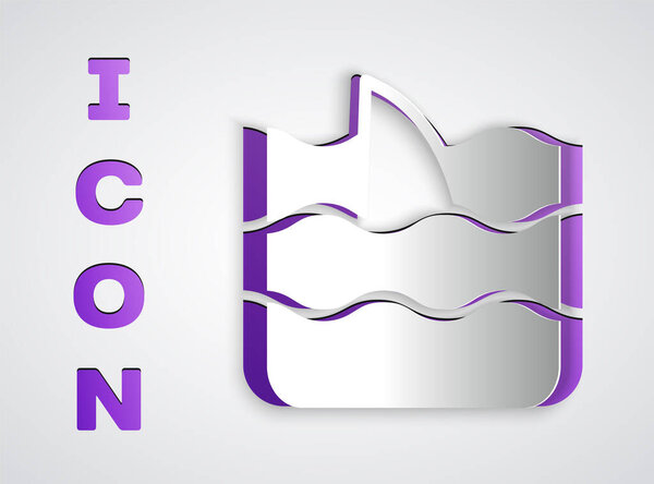 Paper cut Shark fin in ocean wave icon isolated on grey background. Paper art style. Vector.