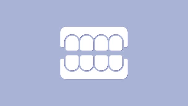 Ícone de mandíbula falsa branca isolado no fundo roxo. Mandíbula dentária ou dentadura, dentes falsos com incisivos. Animação gráfica em movimento de vídeo 4K — Vídeo de Stock