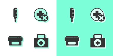 İlk yardım çantasını, medikal termometreyi, merhem tüpünü ve Cross hastanesinin tıbbi ikonunu hazırlayın. Vektör.