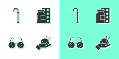 Örgü iğneli iplik yumağı, baston baston, gözlük ve hap şişirme kutusu ikonu. Vektör.