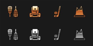 Set kar ayakkabıları, yürüyüş sırt çantası, buz hokeyi sopası ve disk ve dağ ikonu. Vektör.