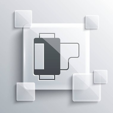 Gri Kamera klasik film rulo kartuş ikonu gri arka planda izole edildi. 35 mm 'lik film kutusu. Film şeridi fotoğrafçı ekipmanı. Kare cam paneller. Vektör.