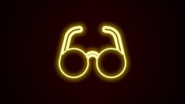 Parlayan neon çizgisi Gözlük simgesi siyah arkaplanda izole edildi. Gözlük çerçevesi sembolü. 4K Video hareketli grafik canlandırması