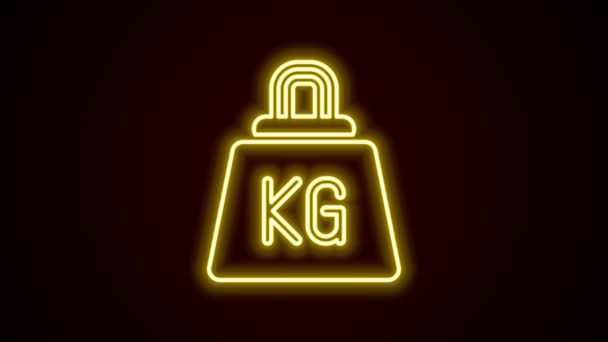 Glowing neon line Weight icon isolated on black background. Blok berbobot Kilogram untuk mengangkat berat dan skala. Simbol massa. Animasi grafis gerak Video 4K — Stok Video