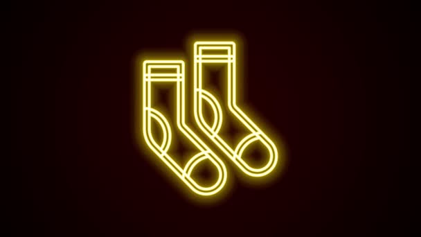 Leuchtende Neon Line Socken Icon isoliert auf schwarzem Hintergrund. 4K Video Motion Grafik Animation — Stockvideo