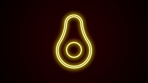 Gloeiende neon lijn Avocado fruit pictogram geïsoleerd op zwarte achtergrond. 4K Video motion grafische animatie — Stockvideo