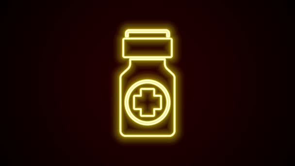 Gloeiende neon lijn Medicijn fles en pillen pictogram geïsoleerd op zwarte achtergrond. Flessenpil teken. Farmaceutisch ontwerp. 4K Video motion grafische animatie — Stockvideo