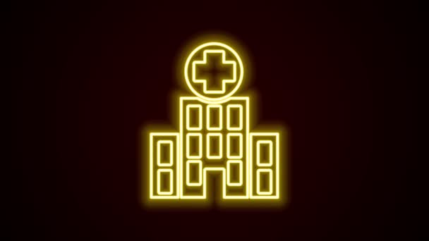 Glowing neon line Medical hospital building with cross icon isolated on black background. Medical center. Health care. 4K Video motion graphic animation — Stock Video