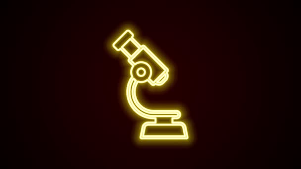 Leuchtendes Neonlinienmikroskop-Symbol isoliert auf schwarzem Hintergrund. Chemie, pharmazeutisches Instrument, mikrobiologisches Vergrößerungswerkzeug. 4K Video Motion Grafik Animation — Stockvideo