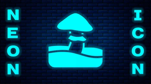 Glowing neon Mushroom icon isolated on brick wall background. Vector — Stock Vector