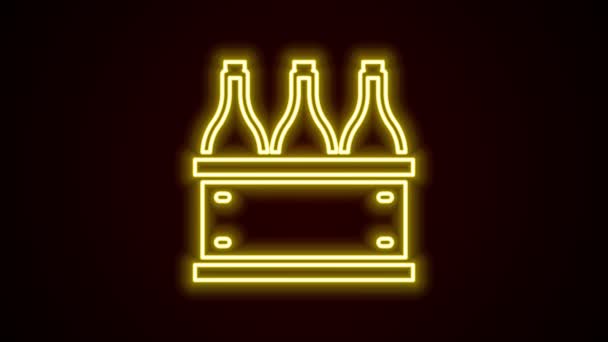 Brillante línea de neón Botellas de vino en una caja de madera icono aislado sobre fondo negro. Botellas de vino en un icono de caja de madera. Animación gráfica de vídeo 4K — Vídeos de Stock