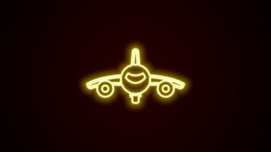 Parlayan neon çizgisi düzlem simgesi siyah arkaplanda izole edildi. Uçan uçak ikonu. Uçak tabelası. 4K Video hareketli grafik canlandırması