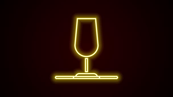 Gloeiende neon lijn Wijnglas pictogram geïsoleerd op zwarte achtergrond. Wijn bordje. 4K Video motion grafische animatie — Stockvideo