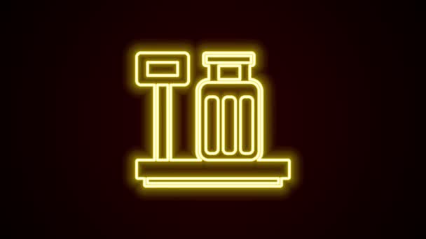 Glowing neon line Scale with suitcase icon isolated on black background. Logistic and delivery. Weight of delivery package on a scale. 4K Video motion graphic animation — Stock Video