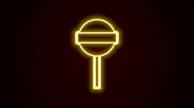 Parlayan neon hattı lolipop simgesi siyah arkaplanda izole edildi. Yemek, lezzetli bir sembol. 4K Video hareketli grafik canlandırması