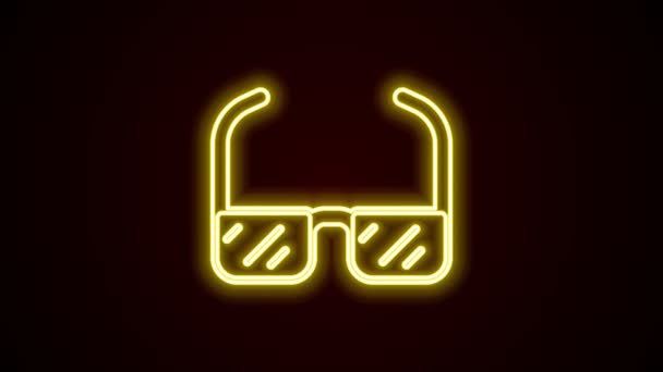 Glowing neon line Safety goggle glasses icon isolated on black background. 4K Video motion graphic animation — Stock Video