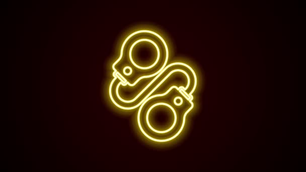 Glödande neon line Handbojor ikon isolerad på svart bakgrund. 4K Video motion grafisk animation — Stockvideo