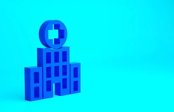 Edifício hospital médico azul com ícone de cruz isolado no fundo azul. Centro médico. Saúde. Conceito de minimalismo. 3D ilustração 3D render — Fotografia de Stock