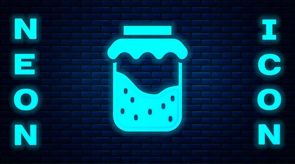 Gloeiende neon Jam pot pictogram geïsoleerd op baksteen muur achtergrond. Vector — Stockvector